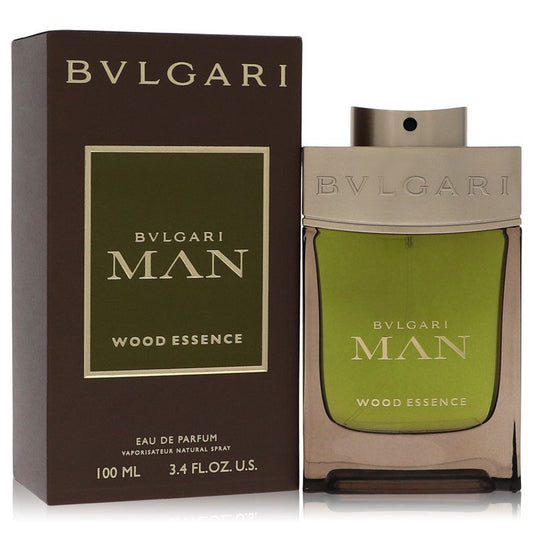 Bvlgari Man Wood Essence Eau De Parfum Spray bottle with sleek black design and silver cap, showcasing luxurious fragrance packaging